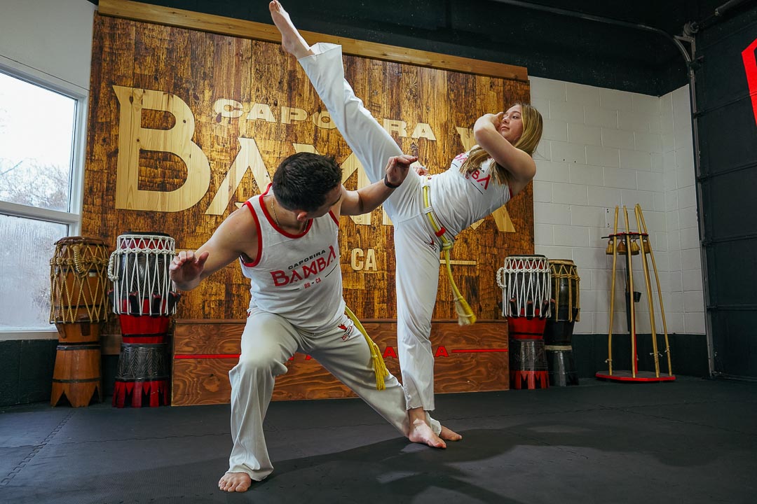 Two Capoeira students training together at Zero Gravity Martial Arts in Mississauga