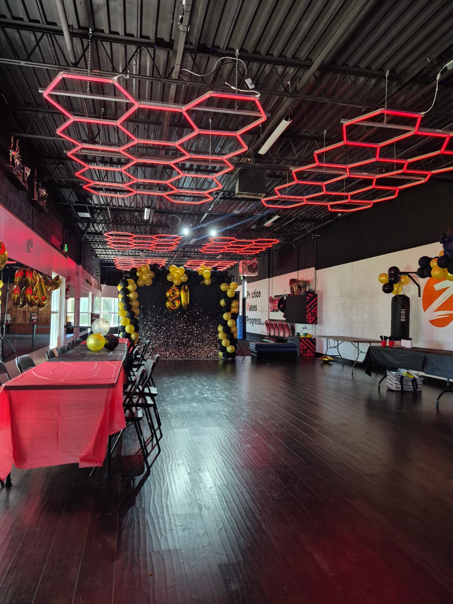 The hardwood event space decorated for a private birthday celebration